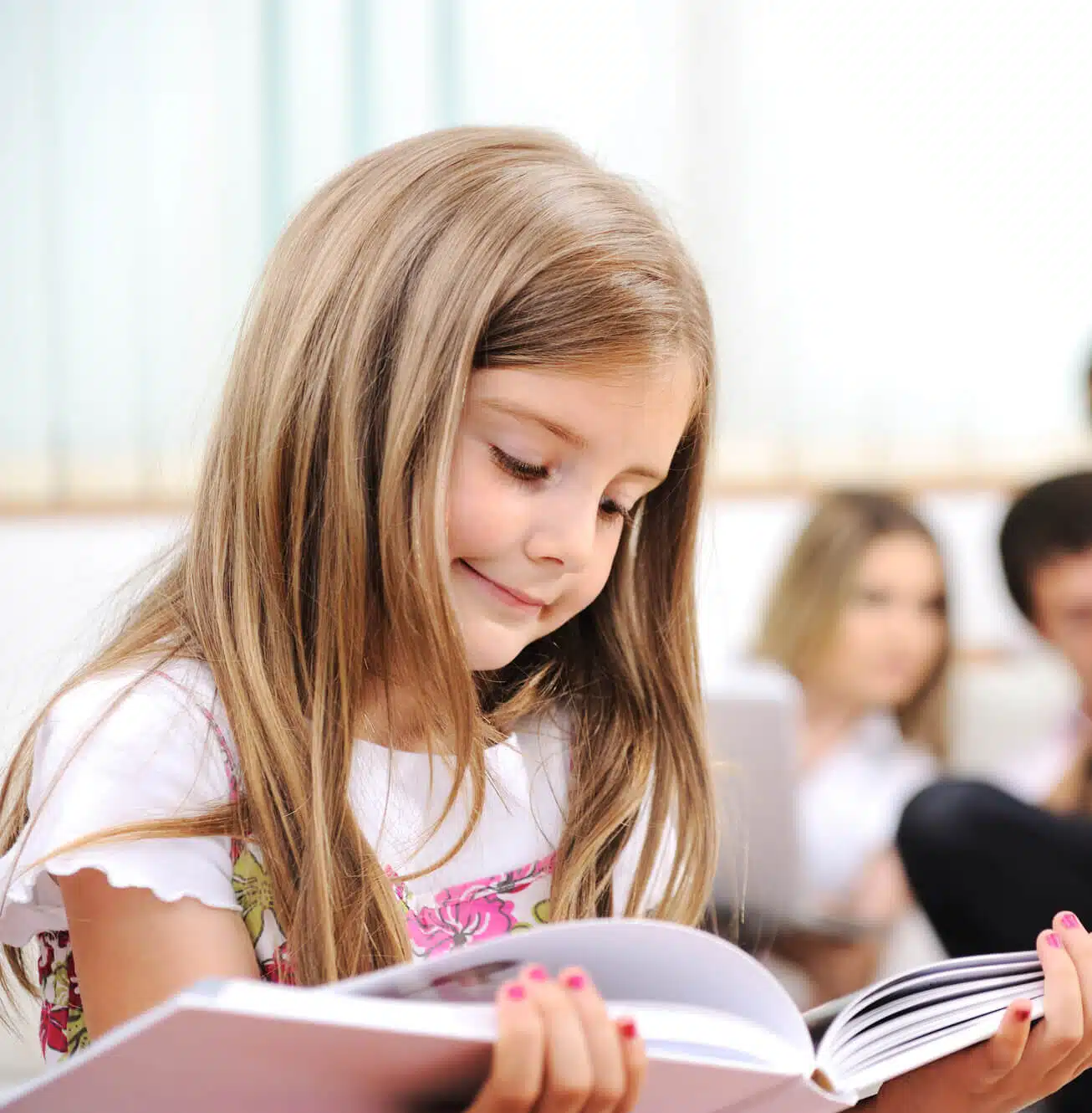 girl reading after going to k-12 learning center