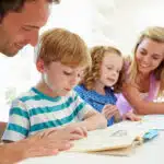 Strategies to Reinforce Learning at Home 3 kids getting help from parents after going to k-12 learning center