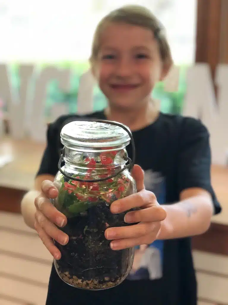 Fun Themes for an Educational Birthday Party 2 child showing a terrarium done at a birthday party in Woodbury Ct