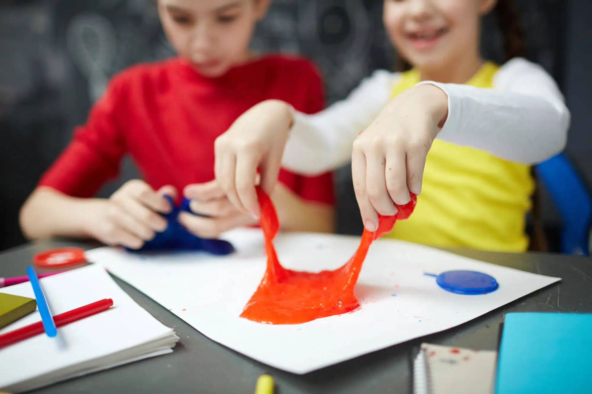 Fun Themes for an Educational Birthday Party 1 kids playing with slime in an educational birthday party in Woodbury CT