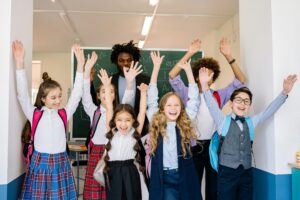 Happy students and teacer at Kindergarten and Beyond, one of the best tutoring franchises!