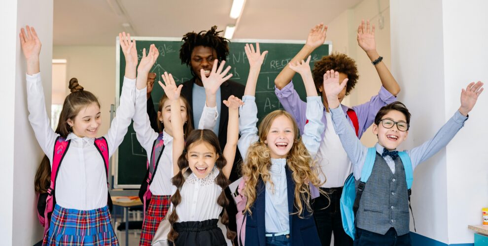 Happy students and teacer at Kindergarten and Beyond, one of the best tutoring franchises!